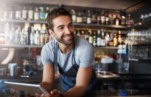 Small business worker behind bar